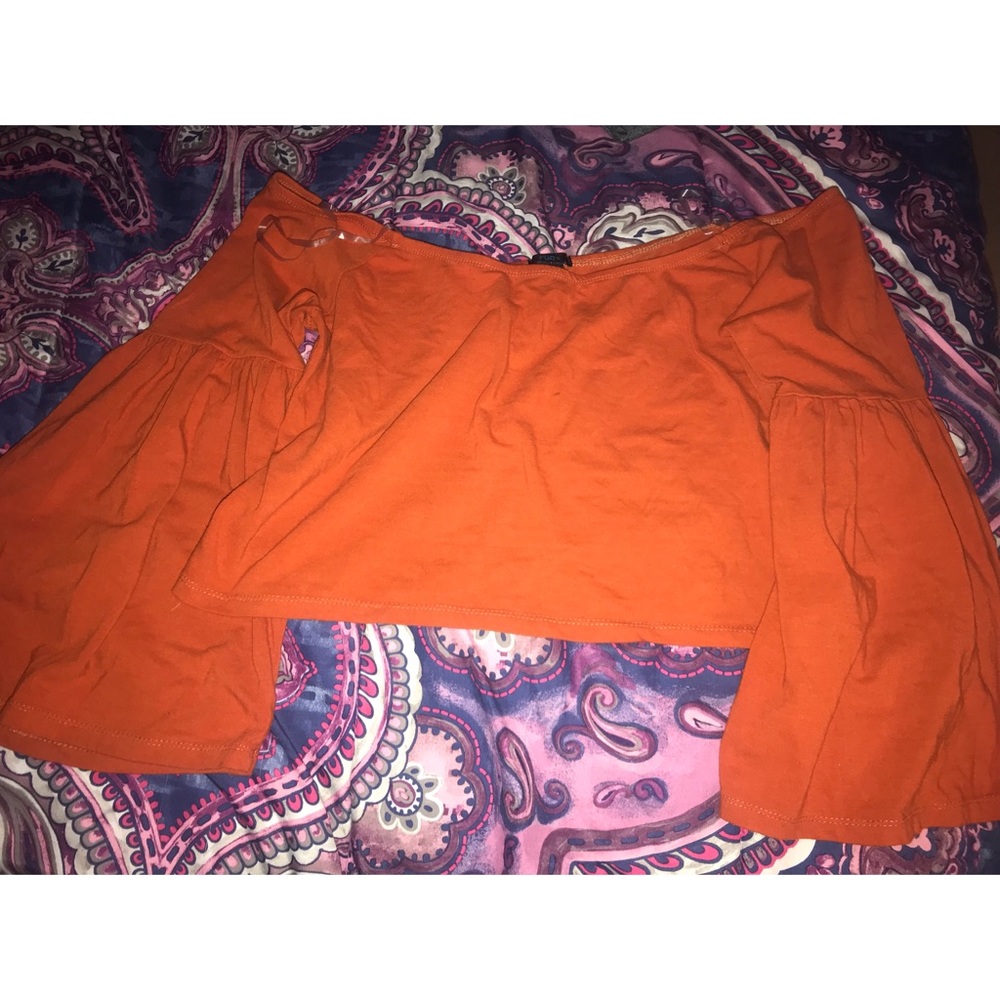 orange long sleeve cropped top